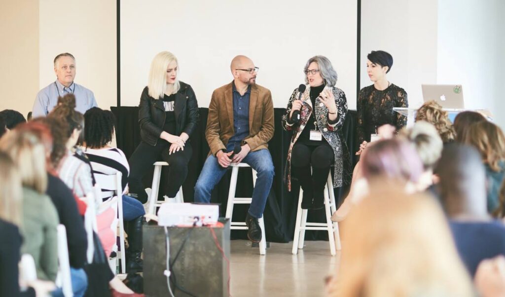 Picture of Marcella Allison speaking on a panel at The Copywriter Club In Real Life event in New York.